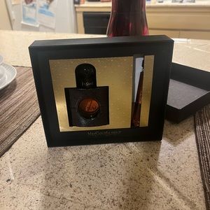 Brand new unopened YSL Black Opium perfume plus travel size bottle